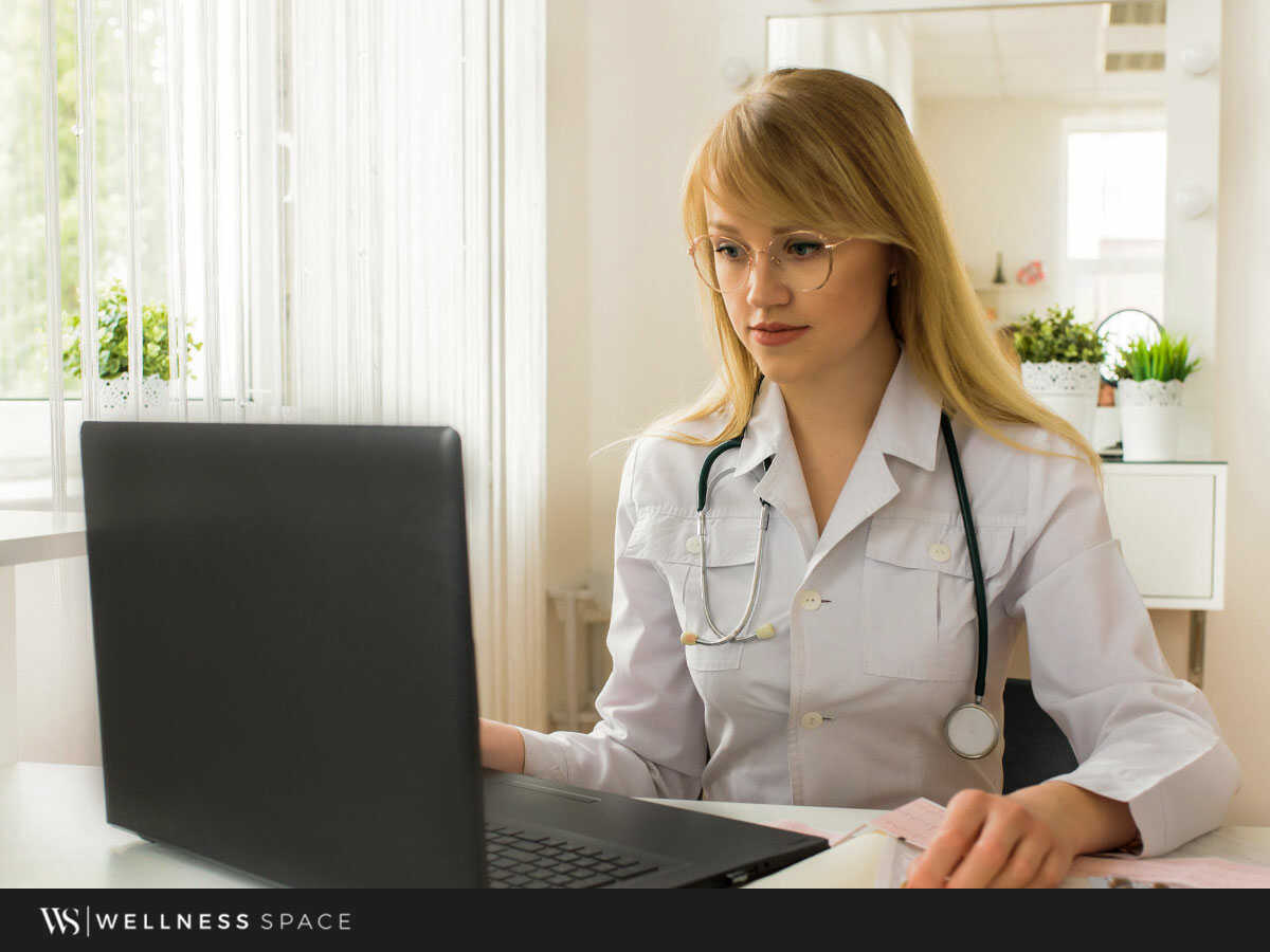 An independent medical practitioner working in her new shared medical office space in Houston, TX